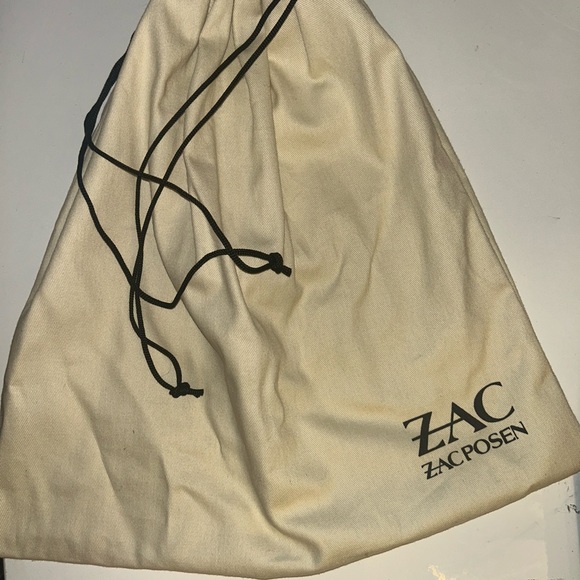 Zac Posen handbag crossbody +dust bag. Tags are not attached
7”x8.5” depth 3.5” - Picture 9 of 9